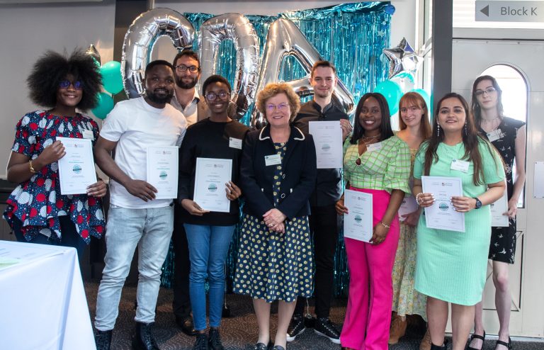 University students and staff gather to celebrate making a difference